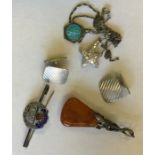 A bag containing silver brooches, pendants etc. Ap