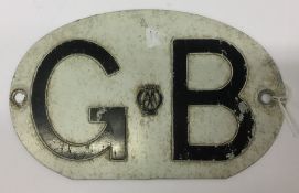 An AA "GB" metal badge. Approx. 18 cms x 11 cms.