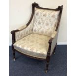 A Continental tapestry back armchair with scroll a