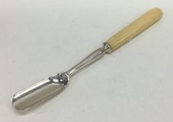 A Georgian silver marrow scoop with turned ivory t