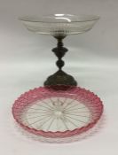 A silver plated and glass centrepiece together wit