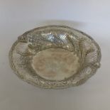 A Georgian circular silver bowl with scroll and fl