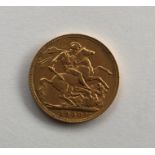 A 1909 full sovereign. Est. £170 - £200.