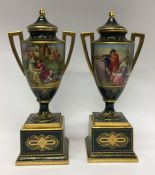 A pair of Vienna decorative gilt vases and covers