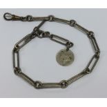A silver long and short link watch chain. Approx.