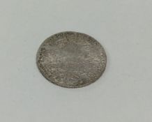 An unusual German silver coin dated 1780. Est. £20