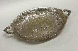 A Continental silver sweet dish embossed with a vi