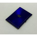 A good quality silver and enamelled cigarette box