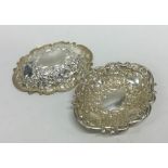 A pair of heavy silver cast bonbon dishes. Approx.