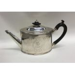 An attractive Georgian silver bright cut teapot wi
