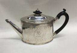 An attractive Georgian silver bright cut teapot wi