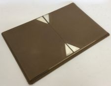 A large silver and leather mounted blotter with hi