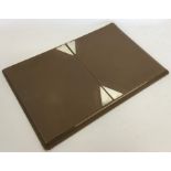 A large silver and leather mounted blotter with hi