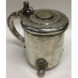 A rare 18th Century silver lidded tankard on three
