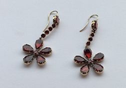 A pair of Antique garnet drop earrings in the form