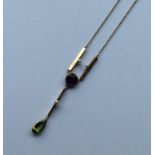 SUFFRAGETTE: A large 15 carat amethyst, peridot an