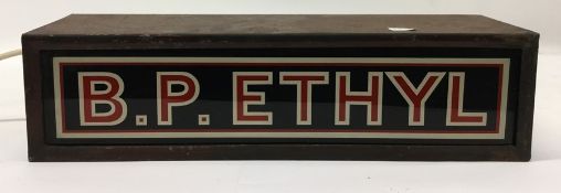 A metal and glass light box inscribed "B. P. Ethyl