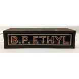 A metal and glass light box inscribed "B. P. Ethyl