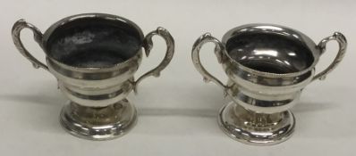 A pair of stylish Continental silver miniature tro