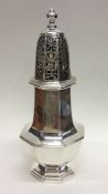 DUBLIN: A large heavy Irish silver caster with pie