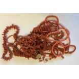 A heavy bag of miscellaneous coral and other beads