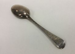 A Georgian Hanoverian silver tablespoon. London. B