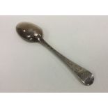 A Georgian Hanoverian silver tablespoon. London. B