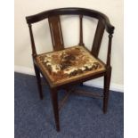 A small Edwardian corner chair with inlaid decorat