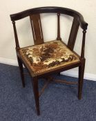 A small Edwardian corner chair with inlaid decorat