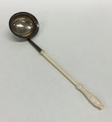 A Georgian miniature toddy ladle with turned ivory