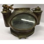 A large brass ship's binnacle with glazed front en