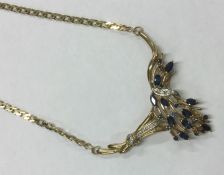 A heavy 9 carat sapphire and diamond necklace. App