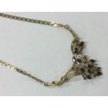 A heavy 9 carat sapphire and diamond necklace. App