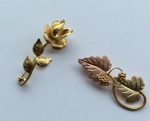 Two 9 carat brooches in the form of flowers. Appro