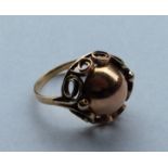 A 14 carat rose gold domed shaped ring. Approx. 3.