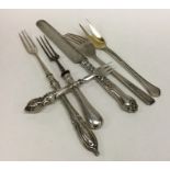 A group of silver mounted bread forks etc. Approx.