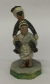 A Continental 19th Century figure of a lady on cir