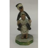 A Continental 19th Century figure of a lady on cir