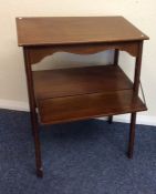 An Edwardian hinged front tea table with inlaid de