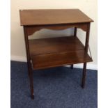 An Edwardian hinged front tea table with inlaid de