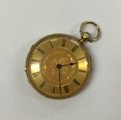 A lady's 18 carat fob watch with gilt dial. Approx