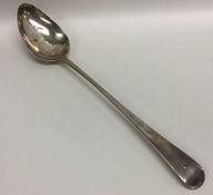 A large Georgian OE pattern silver basting spoon.