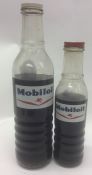 Two various sized "Mobiloil" glass bottles. (2).
