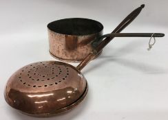 An Antique copper pan together with a copper chest