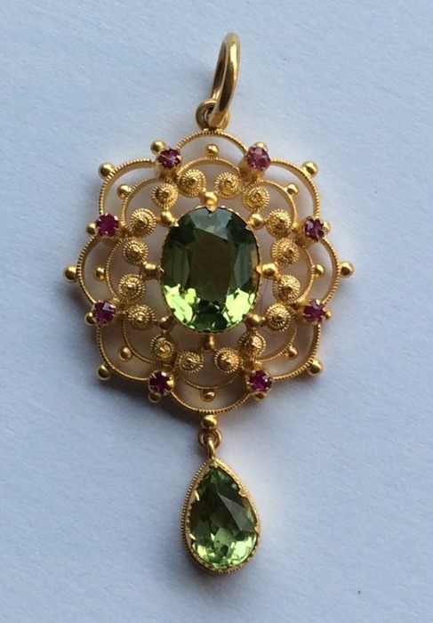 A late Victorian 15 carat peridot and ruby drop pe