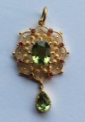 A late Victorian 15 carat peridot and ruby drop pe