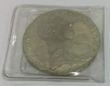 A 1780 German silver coin. Est. £20 - £30.