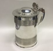 A good quality Georgian silver tankard with domed