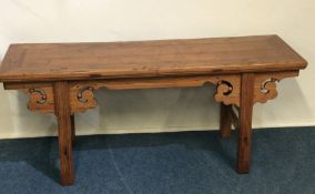 A small Continental altar table with scroll decora