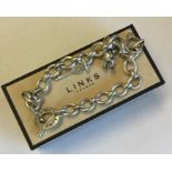 LINKS OF LONDON: A silver curb link bracelet. Appr